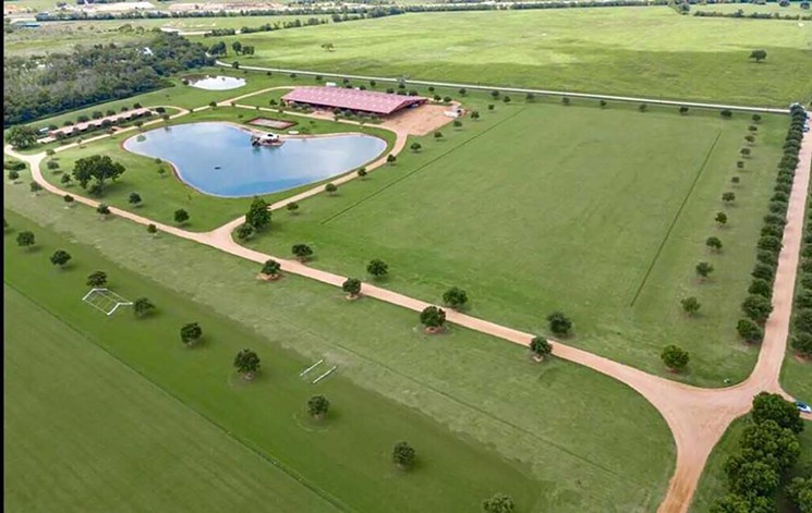 Dana Speer, Realtor® with Century 21 Western Realty has the listing for the Brookshire Farm and Polo Club. - PHOTO BY GOODKARROT REAL ESTATE PHOTOGRAPHY