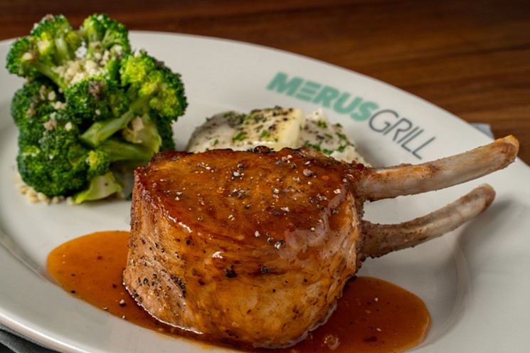 The Double Bone-In Pork Chop at Merus Grill is for American appetites. - PHOTO BY BERT WHITE/J. ALEXANDER'S