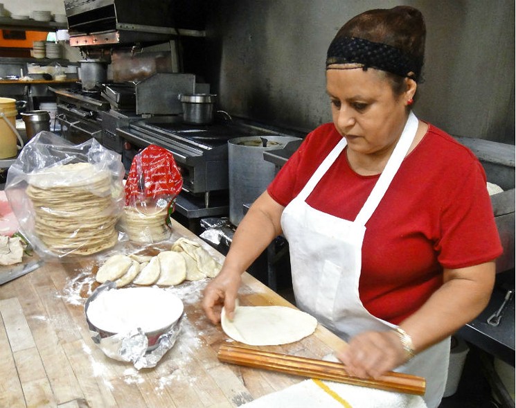 Oralia De La Rosa learned to make flour tortillas from her mother in Nuevo Laredo. She uses high gluten flour. - PHOTO BY ADÁN MEDRANO