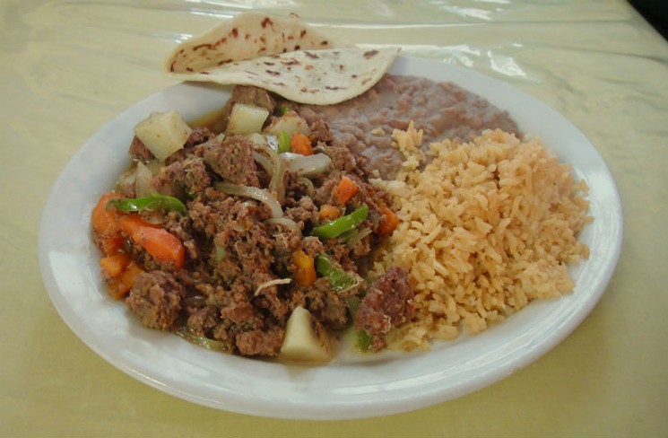 Picadillo, ground beef with vegetables, potatoes, one of the iconic dishes of the Mexican food of Texas. - PHOTO BY ADÁN MEDRANO
