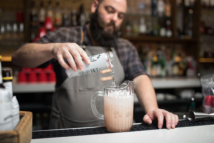 Derek P. Brown serving his signature White Claw Paloma at the first Booze Can Sunday - PHOTO BY LEAH WALKER WILSON