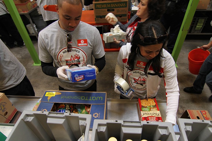 Volunteers during the NBA Day of Service at the Houston Food Bank. - PHOTO BY STATE FARM/FLICKR VIA CC