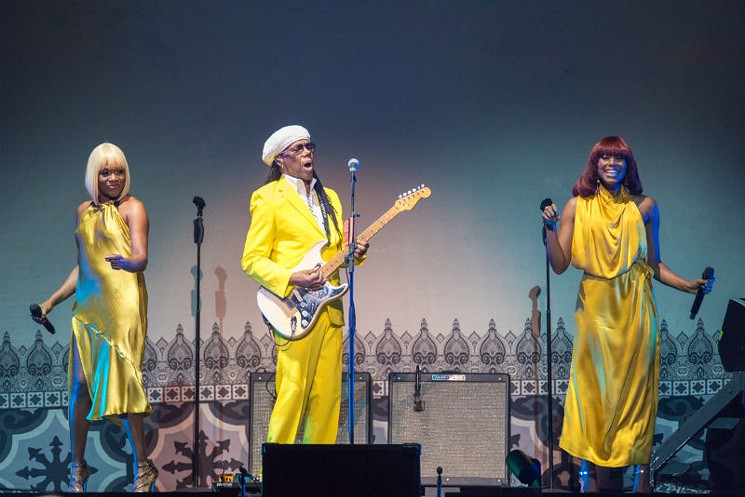 Nile Rodgers (center), the musical genius of Chic, with singers Kimberly Davis (left) and Folami. - PHOTO BY JACK GORMAN