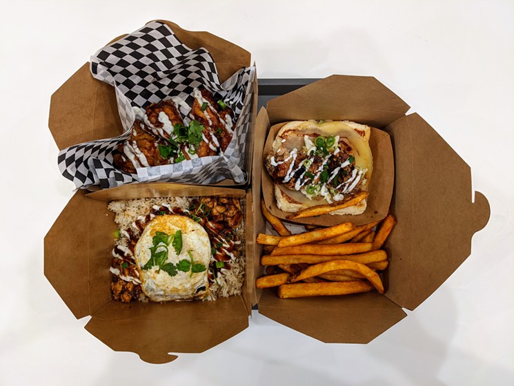 Sticky's signature wings, chicken over rice and karaage sliders. - PHOTO BY CARLOS BRANDON