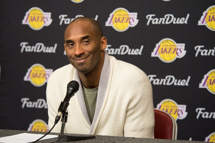 Kobe Bryant doing an interview at his last game in Houston in 2016. - PHOTO BY JACK GORMAN