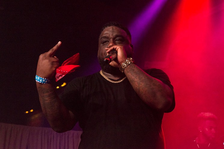 Fat Pimp gives the middle finger during his performance. - PHOTO BY JENNIFER LAKE