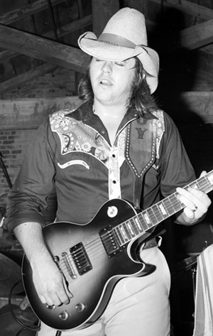 Toy Caldwell onstage at the Warehouse in the 1970's (not the New Year's Eve 1978 concert). - PHOTO BY SIDNEY SMITH/COURTESY OF RECKONING PR