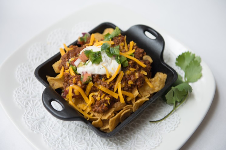 Celebrate Go Texans Day with duck chili Frito pie at Brennan's. - PHOTO BY DRAGANA HARRIS