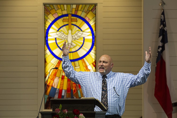 Pastor Frank Pomeroy speaks from the pulpit during a private service for church members, survivors, and victims’ families. - PHOTO LISA KRANTZ-SAN ANTONIO EXPRESS-NEWS/COURTESY OF HACHETTE BOOKS