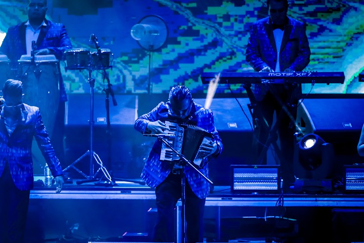 Jorge Mejia Avante played the accordion with masterful agility as Los Angeles Azules packed the house at Smart Financial Centre in Sugar Land, Texas. - PHOTO BY MARCO TORRES