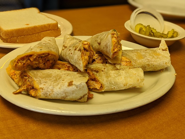 Rolled Chicken Tacos - PHOTO BY CARLOS BRANDON