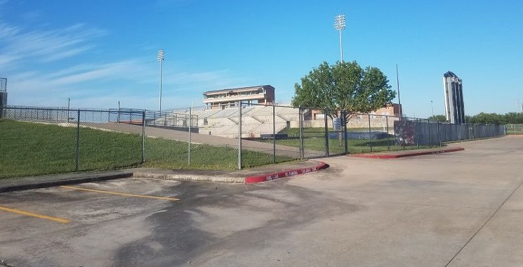 The district's Ken Hall Stadium locked up and empty. - PHOTO BY GARY BEAVER