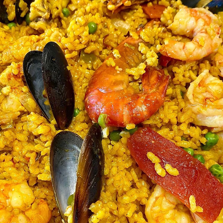 The Paella del Meson at El Meson is filled with seafood and saffron. - PHOTO BY SANDRA CRITTENDEN