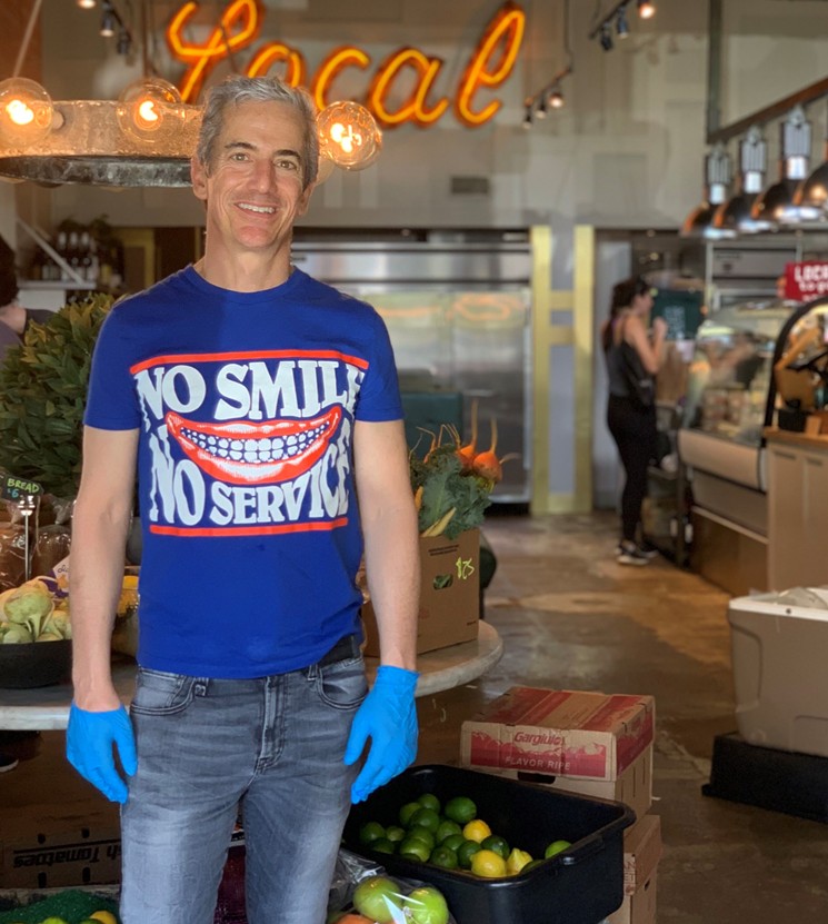 Local Foods owner Benjy Levit offers local with a smile. - PHOTO BY LISA GOCHMAN