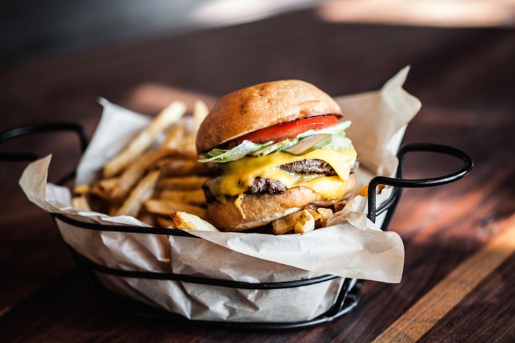 The Cease and Desist Burger is a regular favorite at The Hay Merchant. - PHOTO BY JULIE SOEFER