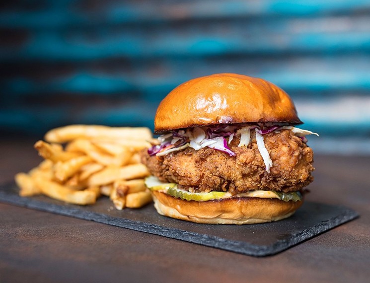 The Yardbird at House of Blues offers a bourbon-butter-brushed fried chicken breast. - PHOTO BY SHANE BROWN