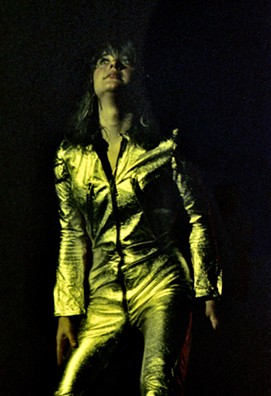 Suzi Quatro steps out of her trademark black leather catsuit for a golden one in 1974. - PHOTO BY ROGER GOULD/COURTESY OF SICILY PUBLICITY