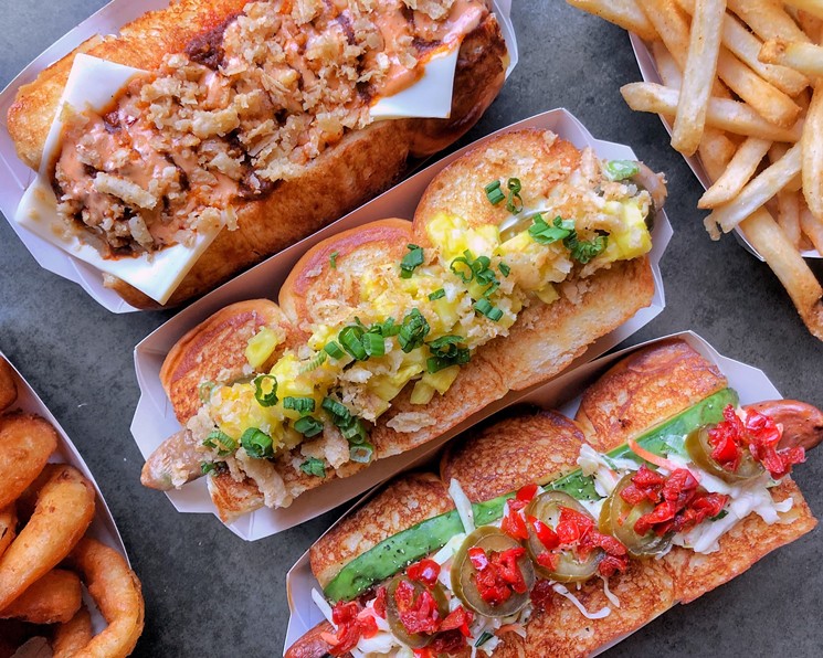 Hot dogs get elevated with creative combinations at Dog Huas. - PHOTO BY PAUL CASTRO/DOG HAUS