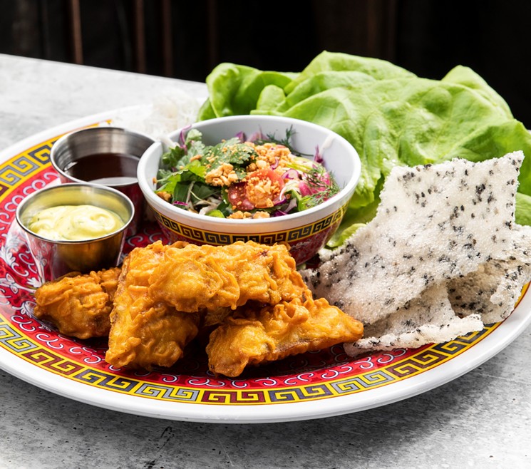 Lucas McKinney offers a Vietnamese version of fish 'n chips. - PHOTO BY JULIE SOEFER