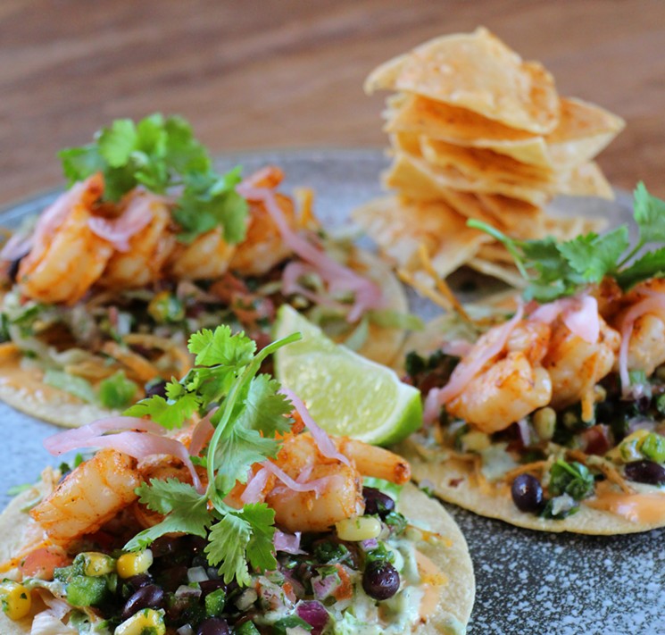 Moxie's new summer menu features these blackened shrimp tacos and more. - PHOTO BY LEIGH VISSER