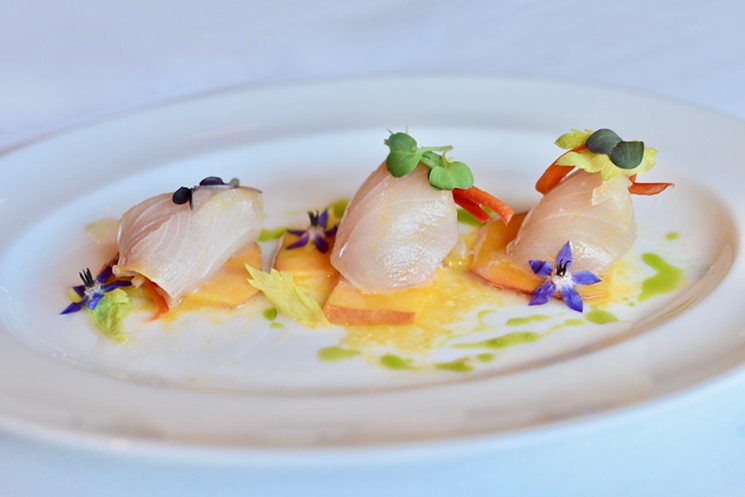 As seen in this hamachi crudo, Texas peaches are on special (while supplies last) at Brennan's. - PHOTO BY KIMBERLY PARK