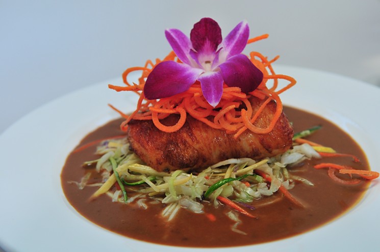 David Chang's Chilean sea bass dish is served in a bath of his special red wine miso sauce. - PHOTO BY ROLITA CHANG