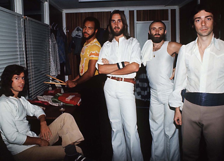 Genesis backstage in 1977: Tony Banks, Chester Thompson, Mike Rutherford, Phil Collins, and Steve Hackett. - PHOTO BY ARMANDO GALLO/COURTESY OF WYMER PUBLISHING