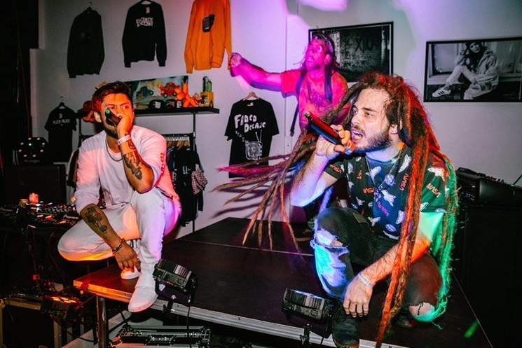 (L-R) Worst Nightmare and Hollywood Dreaddy performing at a house show. - PHOTO BY JUSTIN "JAZZY" PADILLA