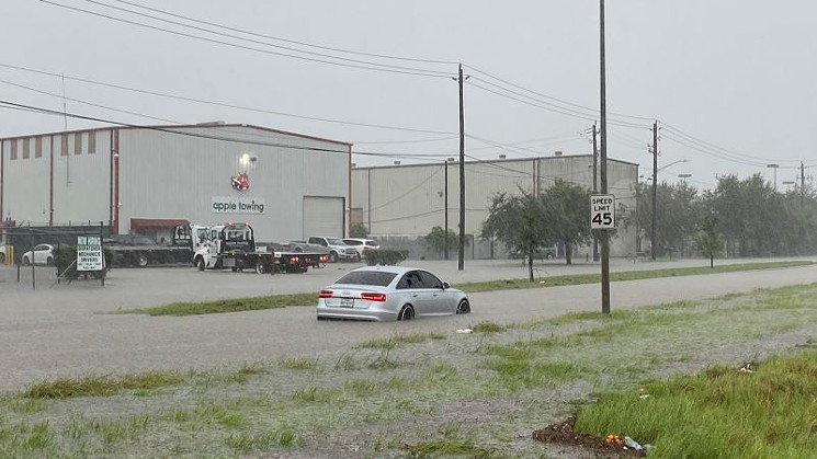 Well if you're going to get flooded out anywhere, right next to a towing business is nice. - PHOTO BY SCHAEFER EDWARDS