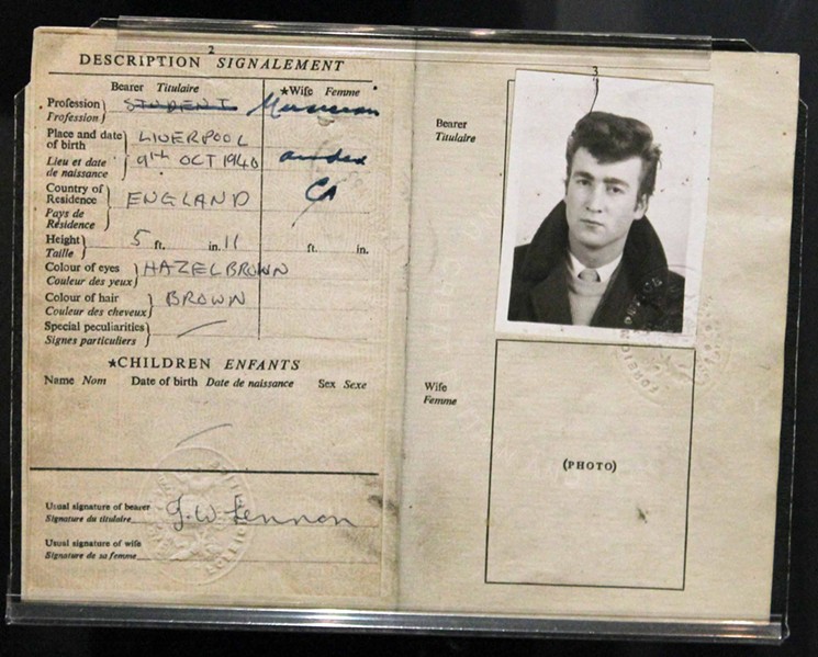 John Lennon's passport is one of thousands of artifacts on display that tell the story of the music at Rock and Roll Hall of Fame in Cleveland. - PHOTO BY BOB RUGGIERO