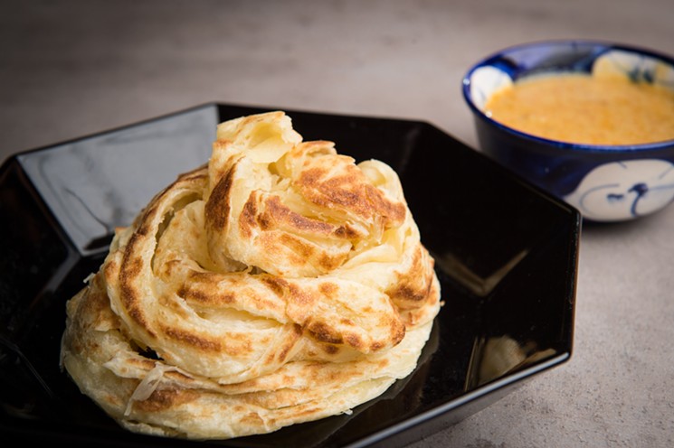 Two bucks and a voting sticker will get you roti canai. - PHOTO BY CHUCK COOK