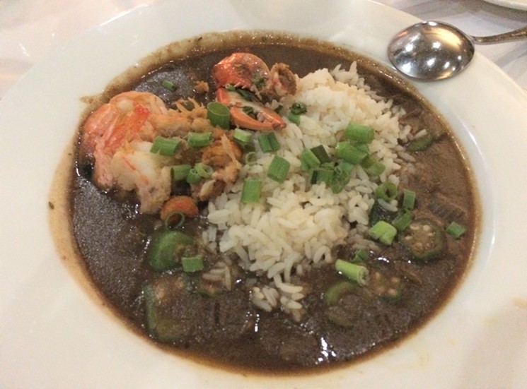 The Seafood Gumbo comes filled with  crab, crawfish and okra. - PHOTO BY LORRETTA RUGGIERO