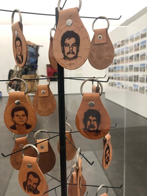 "Greetings from Mexico, or Souvenirs from the Border" by Kerianne Quick shows image of real-life Mexican drug cartel members. - PHOTO BY BOB RUGGIERO