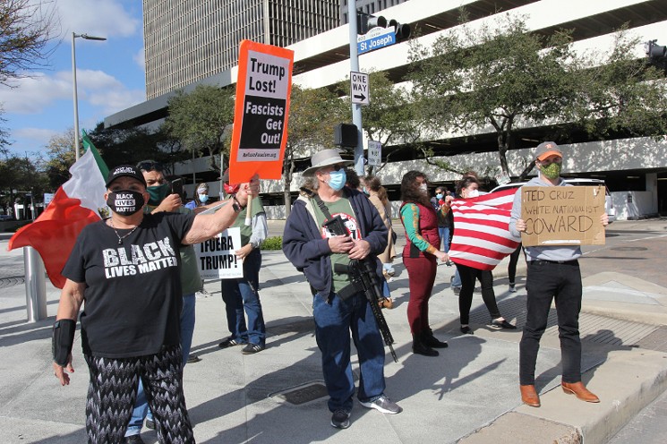 Protesters gathered in front of Cruz's downtown office Thursday. - PHOTO BY DOOGIE ROUX