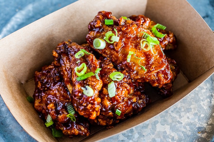 Help Sticky's celebrate one year and get some bonus wings, while you're at it. - PHOTO BY BECCA WRIGHT