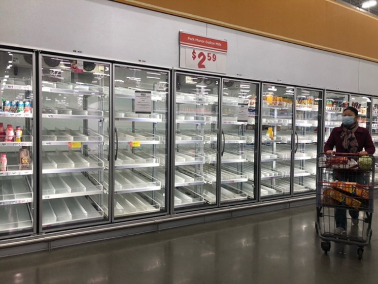 Hope the folks who cleared out these fridge sections don't lose power soon. - PHOTO BY DOOGIE ROUX