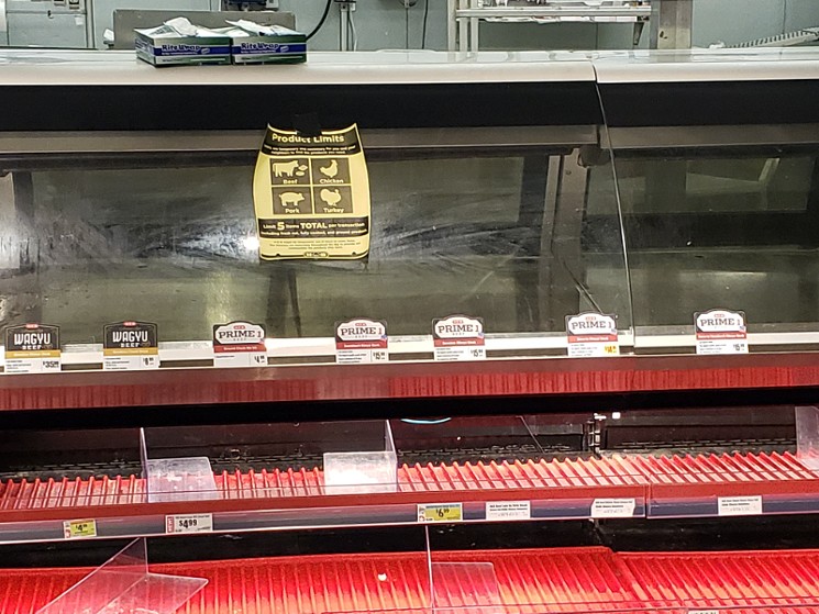 There wasn't a steak in sight at a Missouri City H-E-B this weekend as locals flocked to fill their empty fridges. - PHOTO BY GARY BEAVER
