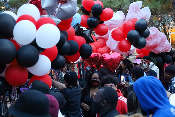Fans gathered with balloons to be released in memorial of Chucky Trill. - PHOTO BY RENE FERNANDEZ