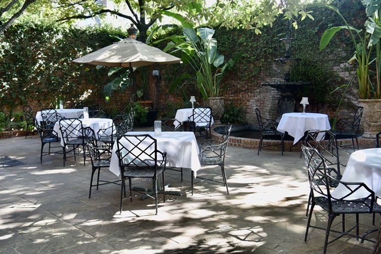 Suck down all-you-can-eat mudbugs at Brennan's picturesque courtyard. - PHOTO BY KIMBERLY PARK