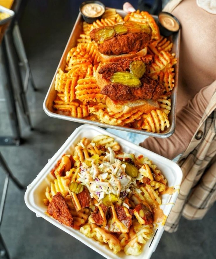 Howdy Hot Chicken piles on the deliciousness. - PHOTO BY IBRAHIM HALAWA