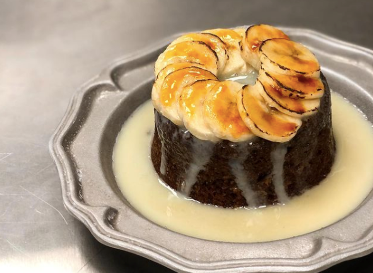 Sticky Date Cake is a tempting dessert of ginger spice cake with caramel and bananas. - PHOTO BY NINFA SANCHEZ