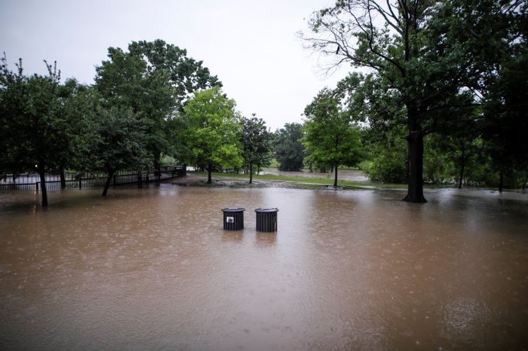 If there's heavy rainfall, residents can count on Buffalo Bayou Park flooding. - PHOTO BY REGGIE MATHALONE