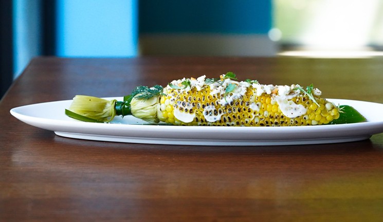 Elote De Calle at Uli's is topped with a lime aioli. - PHOTO BY VICTORIA CHRISTENSEN