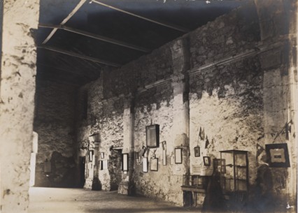 A photo of the interior of the Alamo church from the 1910s. - ADINA EMILIA DE ZAVALA PAPERS, DI_10569, THE DOLPH BRISCOE CENTER FOR AMERICAN HISTORY, THE UNIVERSITY OF TEXAS AT AUSTIN.