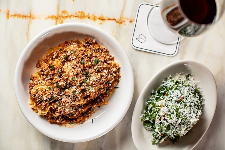 Meaty Bolognese balanced with a kale salad at il Bracco. - PHOTO BY KATHY TRAN
