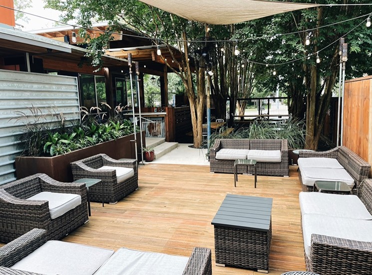 The outdoor patio offers a comfortable space for relaxing with friends. - PHOTO BY CHASITIE LINDSAY