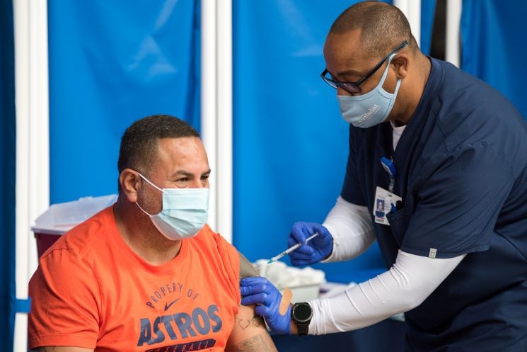 Those who got vaccinated Tuesday earned a free pair of tickets to an Astros game. - PHOTO BY JACK GORMAN