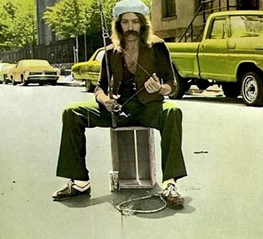 Roger Earl fishing on the streets of NYC. - "FOOL FOR THE CITY" RECORD COVER (DETAIL)