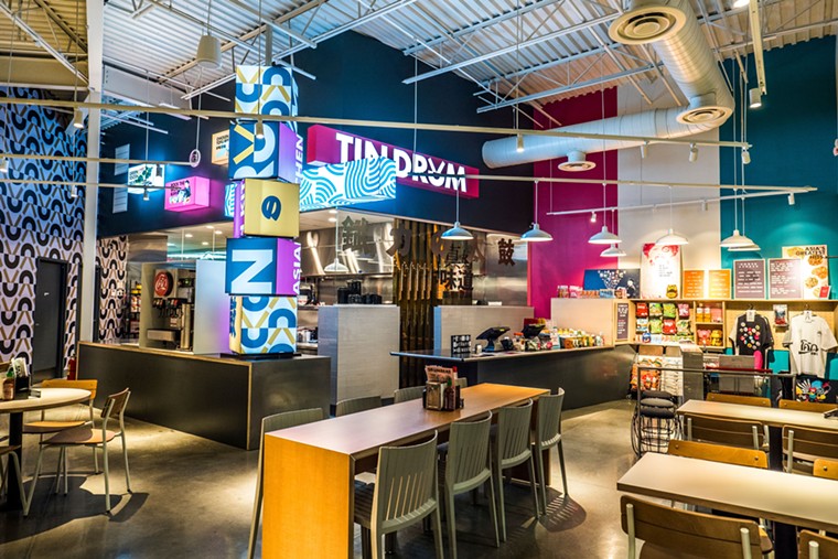 Casual and colorful decor adds to the vibe at Tin Drum. - PHOTO BY HEIDI GELDHAUSER
