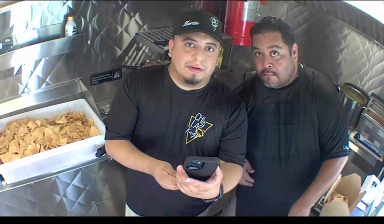 Martin Hernandez Jr. and Lorenzo Reyes are bringing chilaquiles to-go for Cypress residents. - PHOTO BY JOSE SAAVEDRA